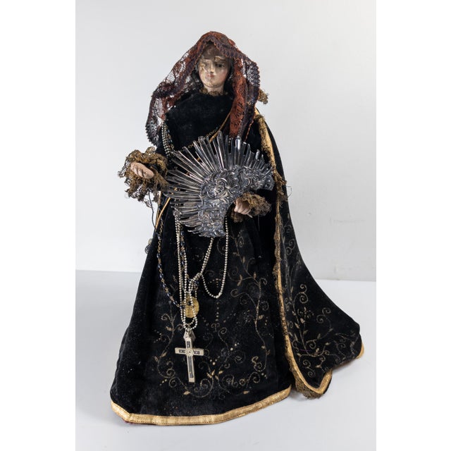 We are offering this Spanish or Spanish Colonial Santos figure. This figure of the Mater Dolorosa is draped in velvet...