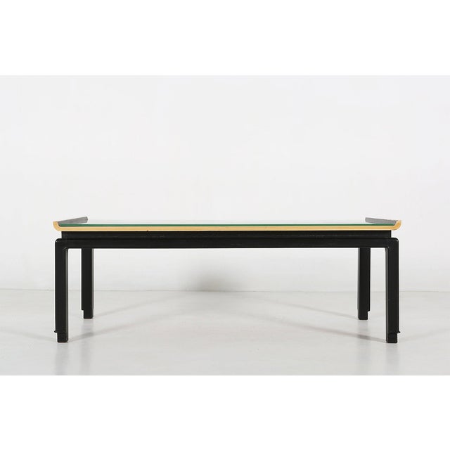 A striking Belgian mid‑century coffee table by De Coene Frères, combining refined craftsmanship with painterly expression....