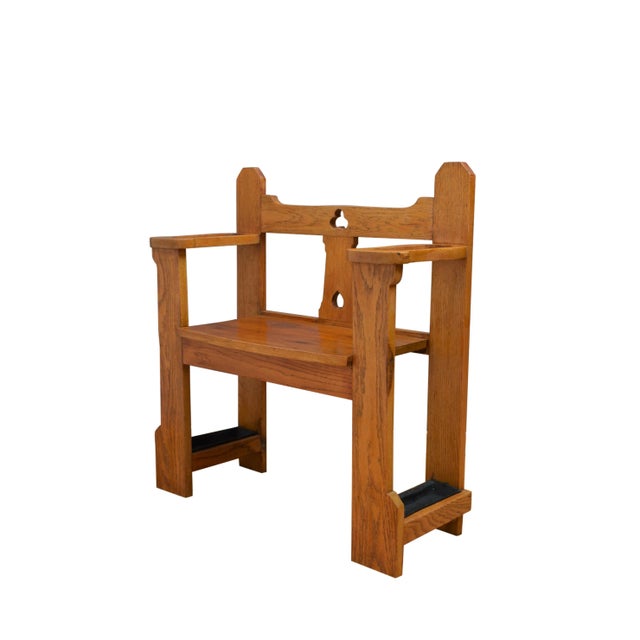 Very attractive Arts & Crafts oak hall bench, having shaped back rail and round seat, raised on front and back uprights...