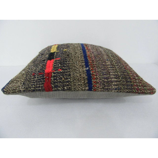Handmade decorative pillow cover made from a vintage Turkish kilim rug. Backed with good quality cotton fabric. Pillow...