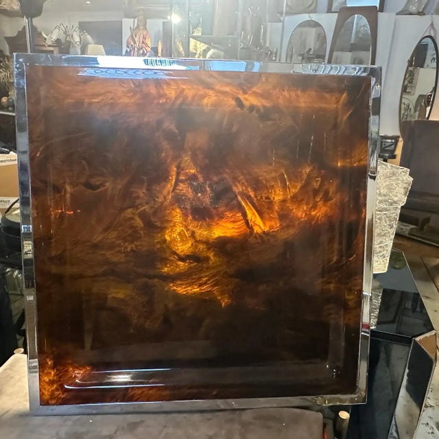 This square Tray by Ulderico Cavinato embodies the spirit of its era, blending cutting-edge materials with timeless design...