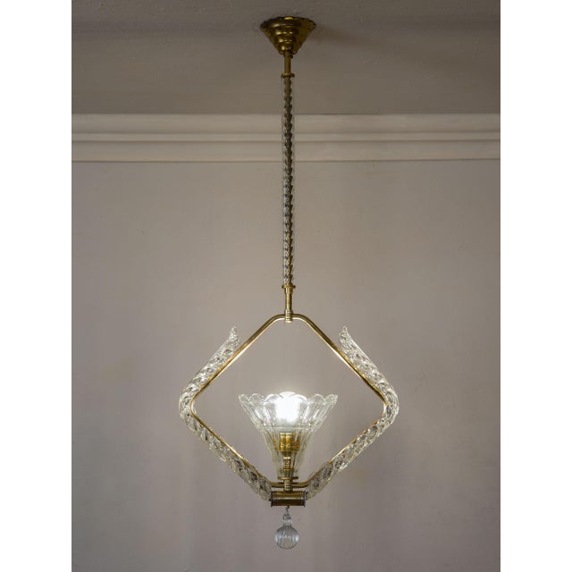 A 1930s-1940s murano blown glass pendant chandelier attributed to barovier & toso. it features a diamond-shaped central...