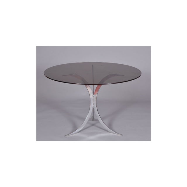 This magnificent Christofle table, designed by Boris Tabacoff, is a true testament to French design from the 1970s. Its...