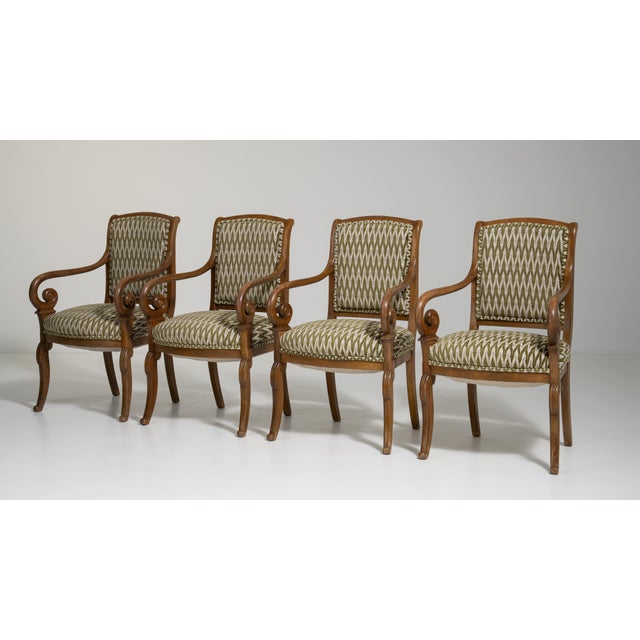 This distinguished set of four Biedermeier armchairs, originating from early twentieth-century France, exemplifies the...