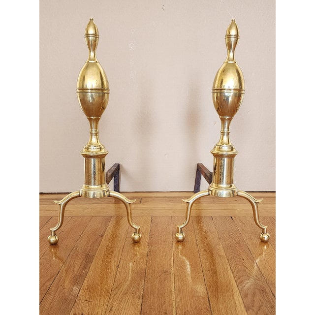 Pair of fine early 19th century Federal brass andirons with lemon top, raised knurled line decoration and arched spurred...