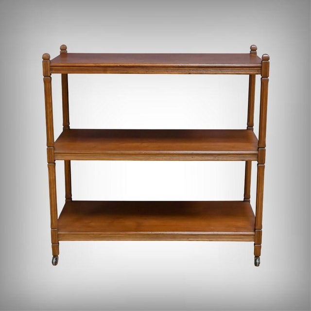 This three-tiered serving cart is captivating thanks to its refined lines and quality craftsmanship. Supported by four...