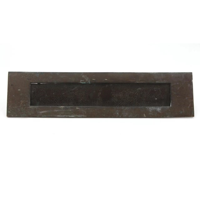 Vintage European spring loaded mail slot that opens inward at 45 degrees to allow mail through. Made of bronze with a dark...