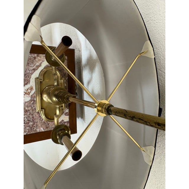 This is a vintage solid brass Bouilotte style table lamp by Frederick Cooper. This table lamp has an elegant French style...