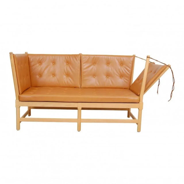 Børge mogensen spoke-back sofa model-1789 with a beechwood frame and new cushions made of cognac aniline leather....