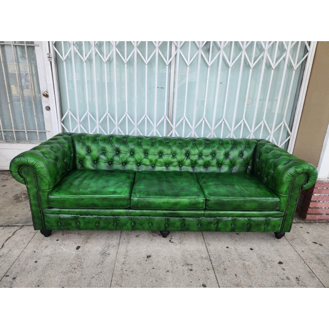 Nice Green Chesterfield Leather Sofa button tufting and rolled arms. emerald or "polo" green tone is often achieved...