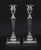 This is an exquisite pair of antique English Victorian Neo Classical silver-plated candlesticks bearing the maker's mark...