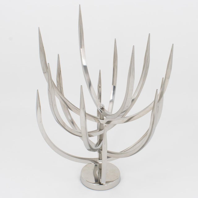 An exceptional creation by renowned French artist Xavier Féal, this striking stainless-steel modernist sculpture, known as...