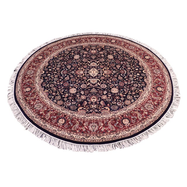 This hand‑knotted Pak Persian round rug showcases the finest expression of traditional Persian artistry. Each piece is...
