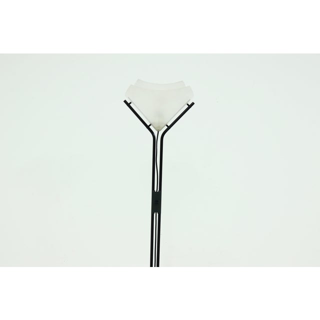 Delphi floor lamp designed by Otto Heuvelink and William ter Kuile for Indoor in the 1980s. The lamp showcases a refined...