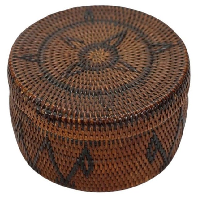 This antique lidded basket is a fine example of traditional Pacific Northwest Tlingit weaving, dating to approximately...