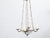 A French opaline chandelier from the early 20th century, with four lights and profiled links. Created in France at the...