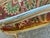 Late 19th Century French Rococo Louis XV Ornately Carved Painted Distressed Corner Captain's Chair For Sale - Image 9 of 12