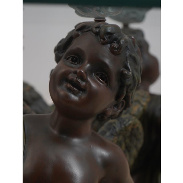 1990s Beveled Glass Top Bronze Finish Cherub Base Cocktail Table For Sale - Image 5 of 12