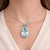 Platinum necklace featuring a striking 48.67-carat pear-cut blue aquamarine, accented by 1.63 carats of white diamonds....