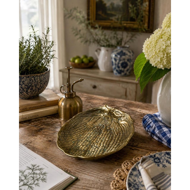 A wonderfully tactile Italian cast-brass bowl modeled as a cluster of corn cobs beneath layered husks. Deeply worked...