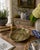 A wonderfully tactile Italian cast-brass bowl modeled as a cluster of corn cobs beneath layered husks. Deeply worked...