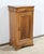 This massive cherry bedside has a top composed of two well -joined boards. The belt offers a doucine drawer. This piece of...