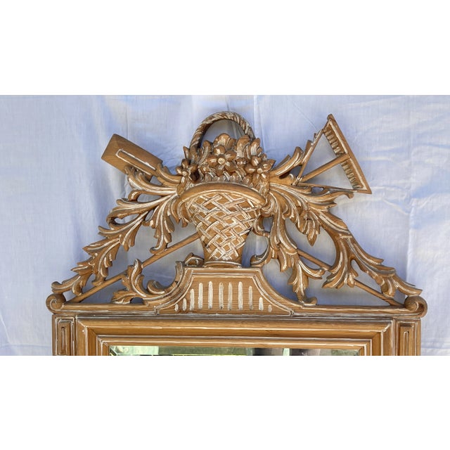 Just in, this charming 18Th C. Style French provincial Carved Wood Mantel Mirror With Garden Tools and Basket. This mirror...