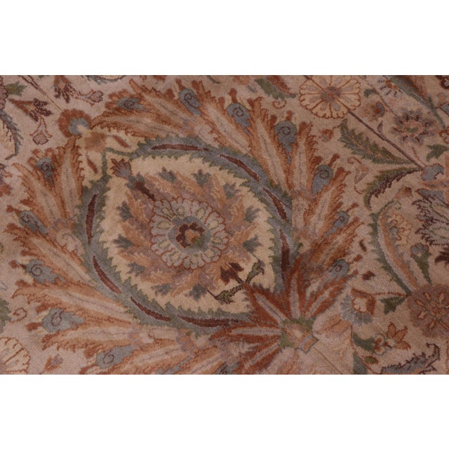 Designed with mesmerizing intricacy and gorgeous color palette, this hand-knotted masterpiece demonstrates the beauty and...