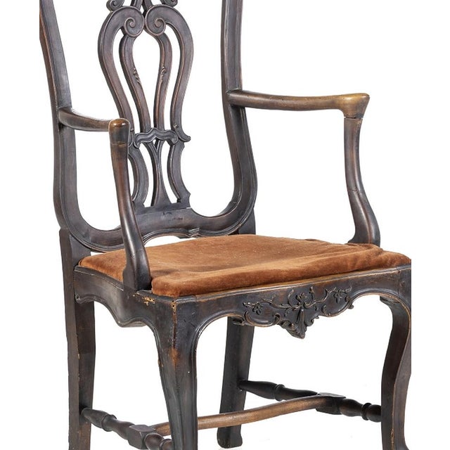 High-backed armchair King Jose style - 18th century. Portuguese; 18th century, made of walnut wood with gilded carvings,...