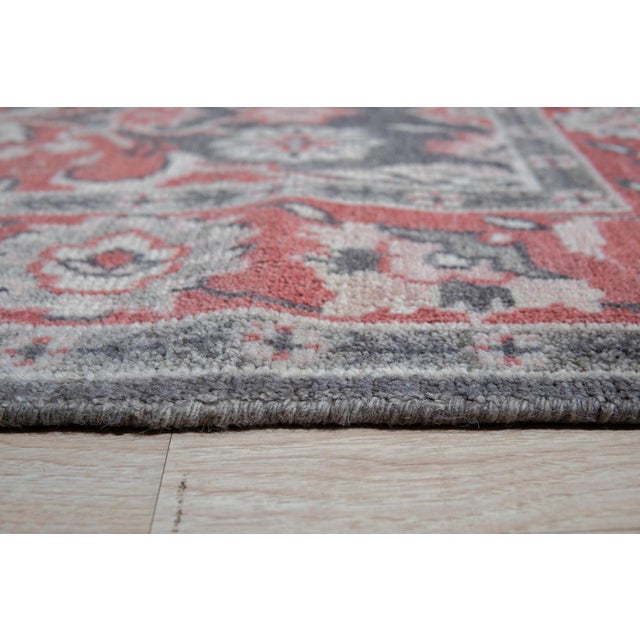Majestic Classic Coral Hand Knotted Wool Rug, Country of Origin: India. This exquisite piece showcases the enduring...