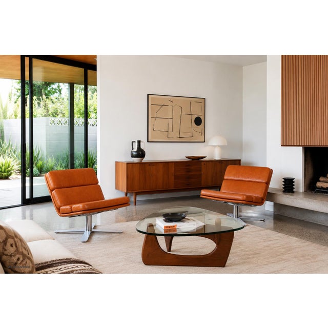 A striking and increasingly rare pair of “Solo” lounge chairs designed by John Follis for Fortress in the 1970s....