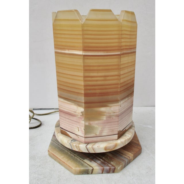 Handmade onyx lantern, made in Mexican onyx, and probably began as a candle hurricane. It has now been electrified with a...