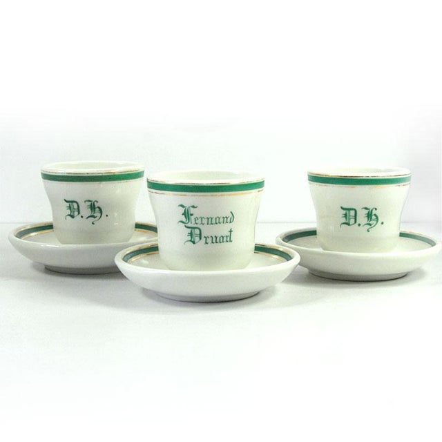 Large, solid cups made of thick porcelain. They originate from Belgium at the turn of the 20th century. They are in very...