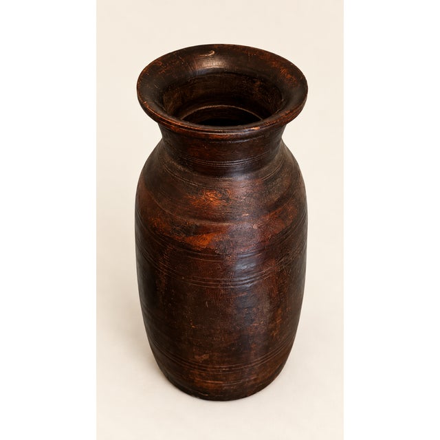 A striking large wooden vessel believed to be of Himalayan origin, possibly from Nepal or Northern India. Reminiscent of...