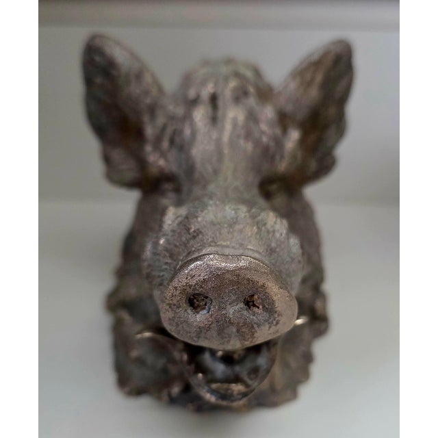 The Silverplate Boars Head Inkwell is a collectible box featuring a design of a boars head made of silver over bronze...