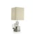 The Pyrite table lamp features a rectangular shade that complements the decoration of the body made of several cubes...