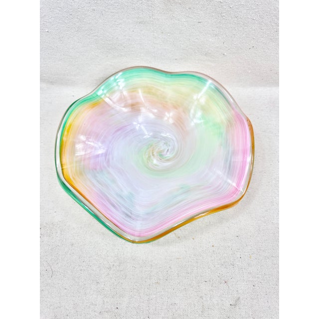 Beautiful vintage art glass bowl. Swirls of colors in pink, green, white and orange. Could use as a serving bowl for fruit...