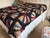 What an amazing crazy quilt! This is a very special quilt in fantastic condition. The colorful fans are set against a...