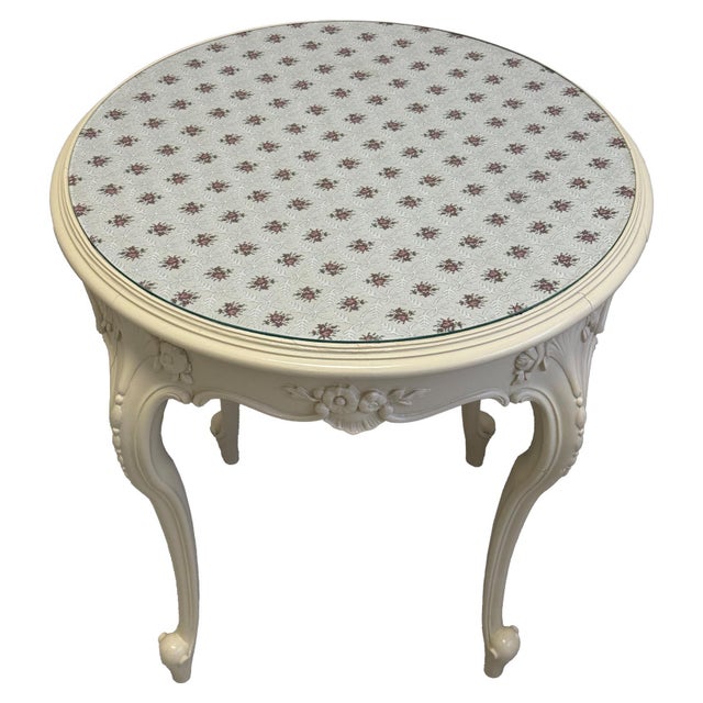 Decorative round side table from the Rococo Revival period, dating to around 1870. The table features elegantly carved...