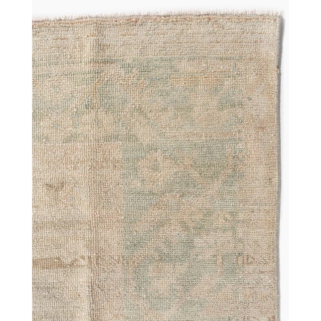 From Kula in Turkey this vintage hand knotted light colored rugs are similar to Oushaks and are among the most popular...