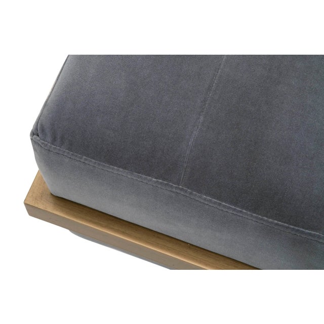 This mid-century modern bench has a unique and plush design. Upholstered with a lush dark gray velvet over a high-density...