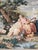 This large vintage tapestry presents an elaborate romantic garden scene with two elegantly dressed women surrounded by...