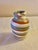 Beautiful small vintage desert boho chic pottery vase in the style of Niloak. The clay has swirled colors of cream, brick...