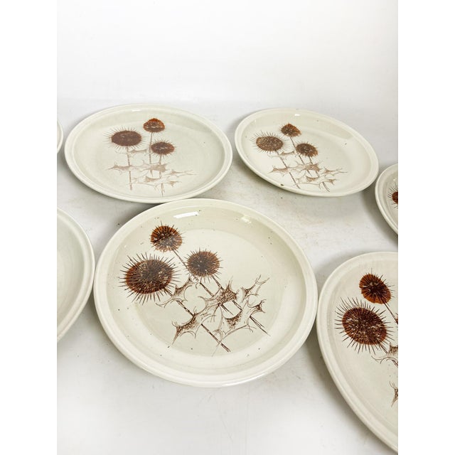 The dimensions are those of a plate. Set of 9 ceramic plates with a thistle design, made in France in the 1970s. This...