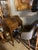 antique Arts & Crafts/Mission-style oak drop-front secretary, circa 1900–1925. It features tiger-grain oak, interior...