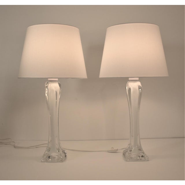 Very large white core art glass table lamps designed by paul kedelv for flygsfors. These lamps are made of solid art glass...