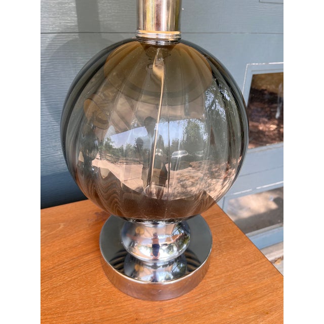 A showstopping pair of 1970s Hollywood Regency table lamps that command attention in any room. Each features a large...