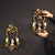 A pair of German wall lights from the early 20th century. Beautifully sized and decorated in bronze, brass, enameled...