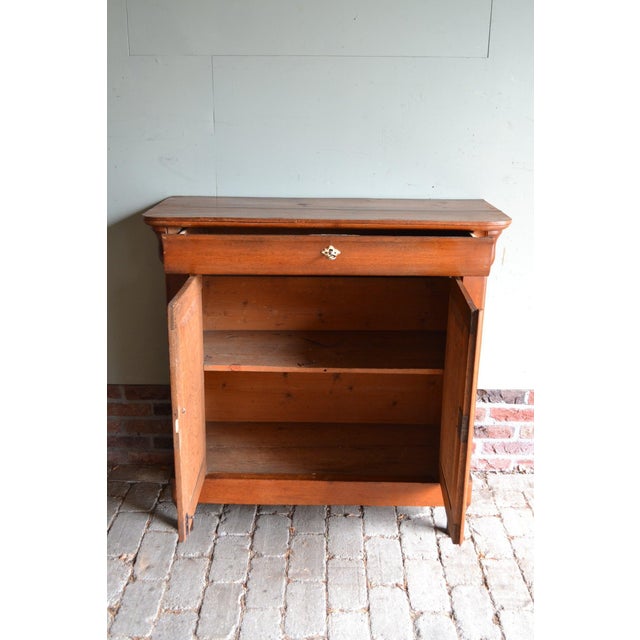 19th-century Dutch oak sideboard, maid's cabinet, commode. The height is 94 cm. The width is 95 cm. The depth is 42 cm. A...