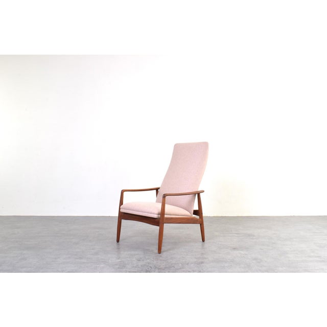 The armchair designed by Søren Ladefoged and produced by SL Møbler in Denmark is a refined example of 1960s Scandinavian...